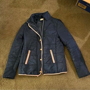 Small navy blue coat with beige trim